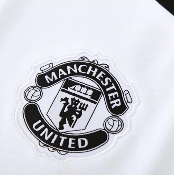 Manchester United “Noir Eclipse” Tracksuit