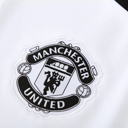 Manchester United “Noir Eclipse” Tracksuit